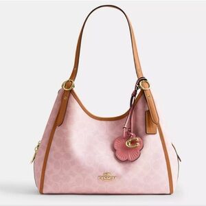 NWT Coach CEL13 Erin Shoulder Bag In Signature Canvas With Charms Powder Pink